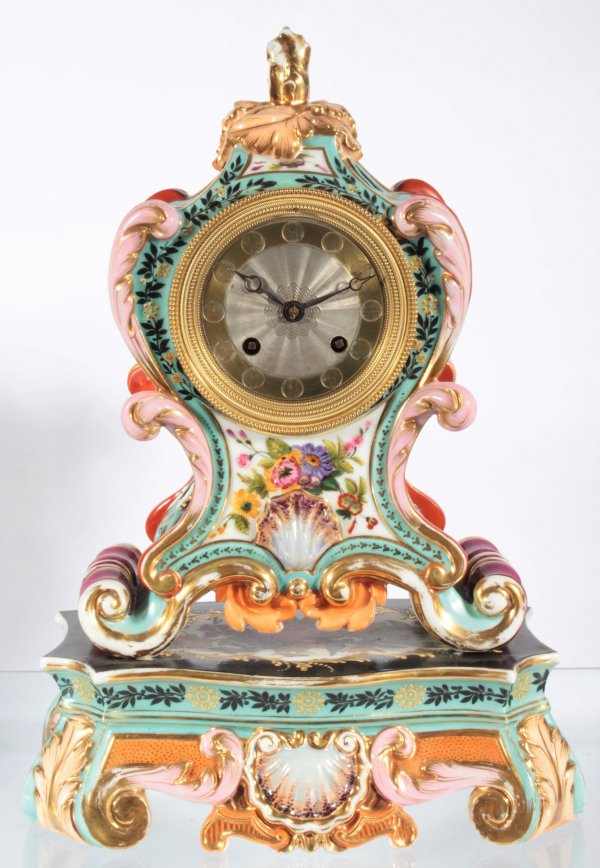 French porcelain clock with pair vases